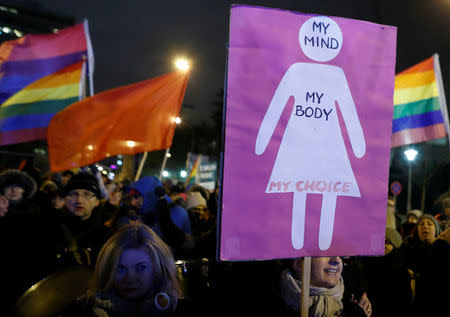 People gather to protest against plans to further restrict abortion laws in front of the Parliament in Warsaw, Poland January 13, 2018. REUTERS/Kacper Pempel