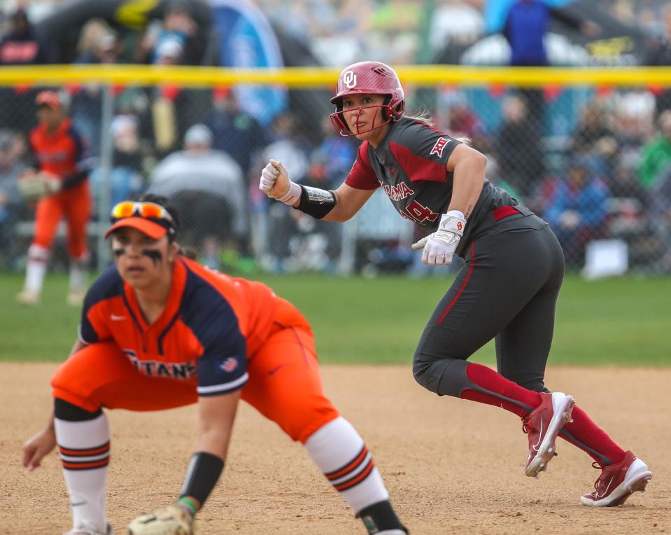 Oklahoma's Jayda Coleman (24) takes off from first base as a pitch is thrown during their game at the Mary Nutter Collegiate Classic softball tournament in Cathedral City, Calif., Friday, Feb. 24, 2023. 