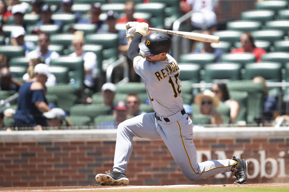 Pittsburgh Pirates' Bryan Reynolds (10) swings at pitch in the first inning of a baseball game against the Atlanta Braves, Sunday, June 12, 2022, in Atlanta. (AP Photo/Hakim Wright Sr.)