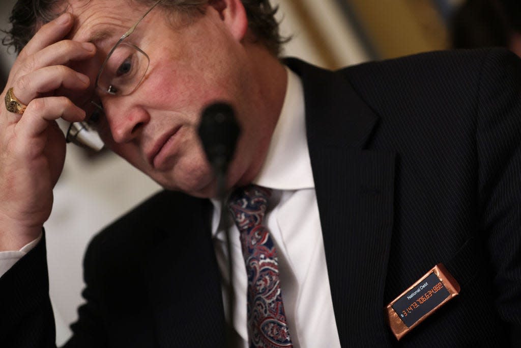 WASHINGTON, DC - JANUARY 31: U.S. Rep. Thomas Massie (R-KY) wears a ticker that shows the national debt numbers during a hearing before the House Committee on Rules January 31, 2023 in Washington, DC. The committee held a hearing to discuss â€œH. Con. Res. 9 â€“ Denouncing the horrors of socialism resolution.â€ (Photo by Alex Wong/Getty Images)