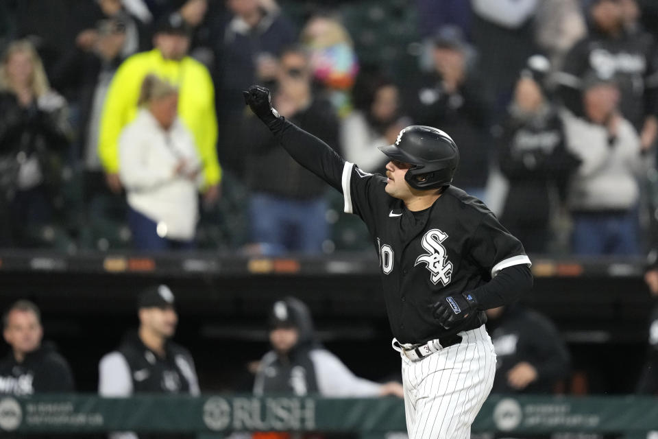 Chicago White Sox's Jake Burger celebrates his two-run home run off Cleveland Guardians starting pitcher Peyton Battenfield during the fourth inning of a baseball game Wednesday, May 17, 2023, in Chicago. (AP Photo/Charles Rex Arbogast)