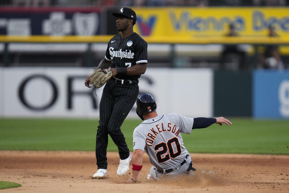Detroit Tigers' Spencer Torkelson steals second base next to Chicago White Sox shortstop Tim Anderson during the fourth inning of a baseball game Friday, June 2, 2023, in Chicago. (AP Photo/Erin Hooley)