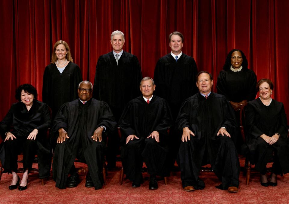 Supreme Court justices pose for their group portrait at the Supreme Court in Washington, U.S., October 7, 2022. Seated (L-R): Justices Sonia Sotomayor, Clarence Thomas, Chief Justice John G. Roberts, Jr., Samuel A. Alito, Jr. and Elena Kagan. Standing (L-R): Justices Amy Coney Barrett, Neil M. Gorsuch, Brett M. Kavanaugh and Ketanji Brown Jackson.