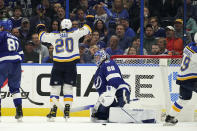 St. Louis Blues left wing Brandon Saad (20) celebrates after scoring past Tampa Bay Lightning goaltender Andrei Vasilevskiy (88) during the second period of an NHL hockey game Thursday, Dec. 2, 2021, in Tampa, Fla. (AP Photo/Chris O'Meara)