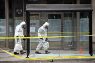 <p>Hazmat workers work around the scene at Yonge St. on April 24, 2018 in Toronto, Canada. (Photo: Cole Burston/Getty Images) </p>