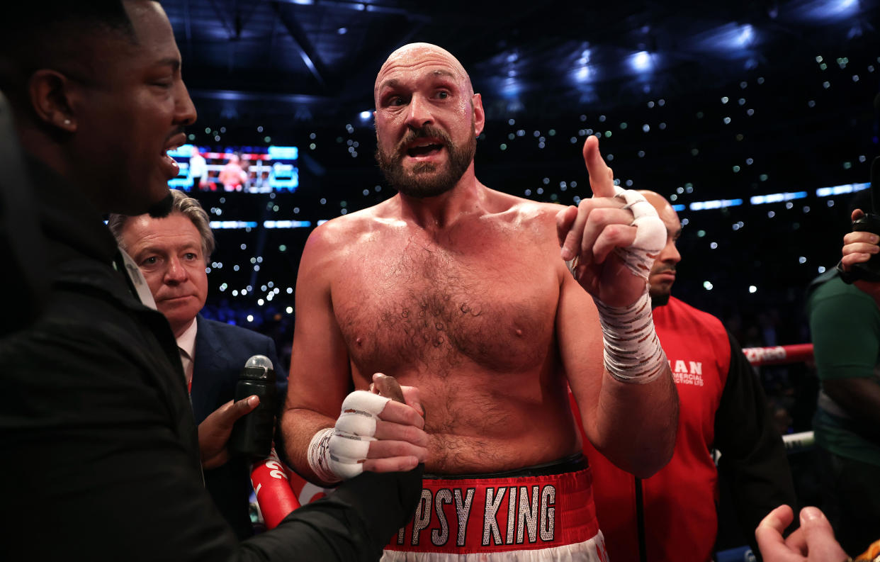 LONDON, ENGLAND - APRIL 23: Tyson Fury talks with Dillian Whyte's corner following the WBC World Heavyweight Title Fight between Tyson Fury and Dillian Whyte at Wembley Stadium on April 23, 2022 in London, England. (Photo by Julian Finney/Getty Images)