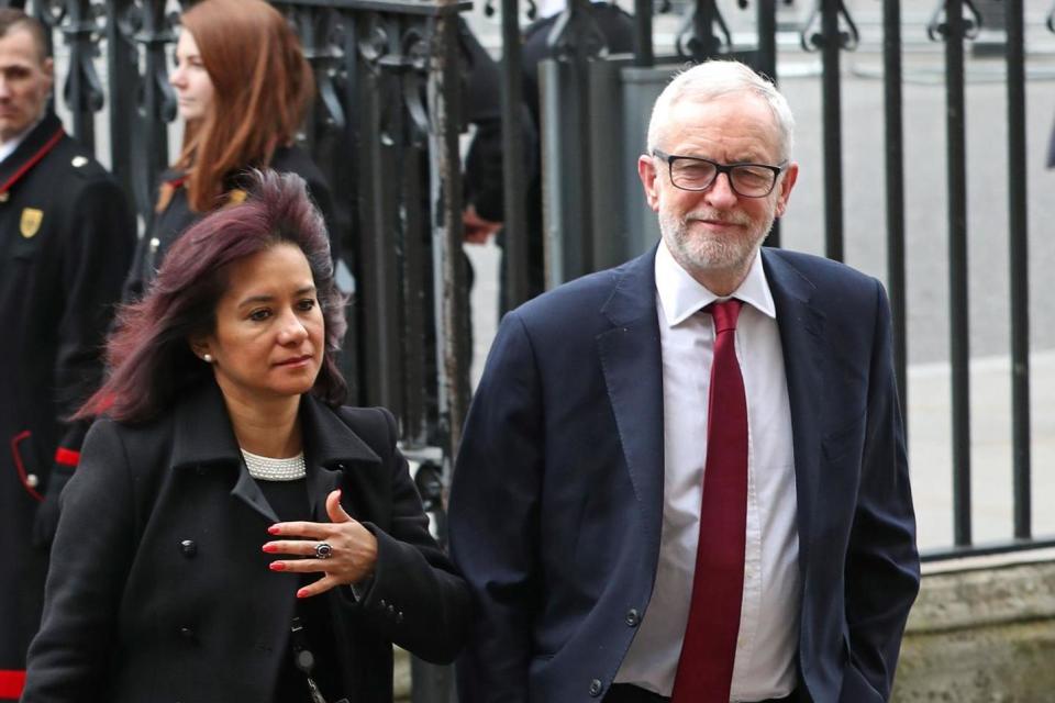 Jeremy Corbyn alongside his wife, Laura Alvarez (PA)