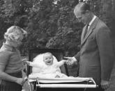 <p>Smiles all round when<span> Philip took Prince Andrew for a stroll with the help of big sister Princess Anne in 1960. [</span>Photo: Getty Images] </p>