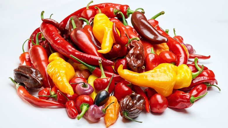 chilli peppers on white background