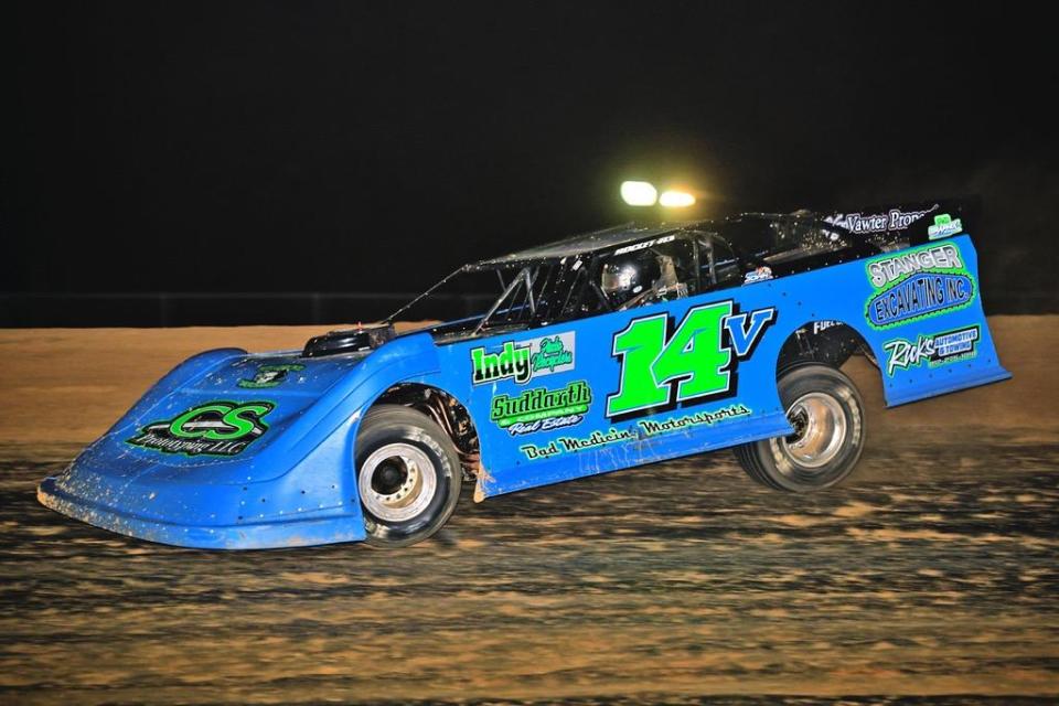 Bedford's Britan Godsey glides along the rim at Brownstown Speedway en route to winning the ILMS Late Model feature on April 16.