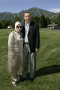 <p>Recep Tayyip Erdogan, the prime minister of Turkey, and his wife, Emine, stop to have the picture taken with a mountain background as they head back to their room at the annual Allen and Co.’s media conference Wednesday, July 6, 2005, in Sun Valley, Idaho. (AP Photo/Douglas C. Pizac) </p>