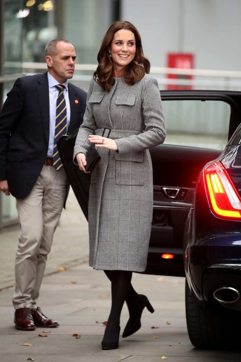 Kate Middleton stunned in this $870 belted coat the Children's Global Media Summit. Photo: Getty Images