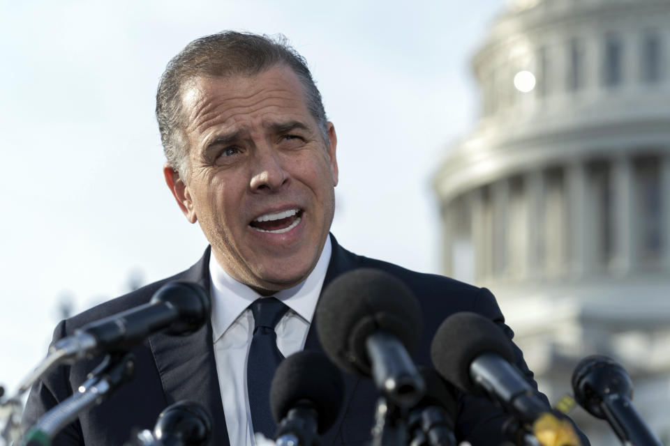 FILE - Hunter Biden, son of President Joe Biden, talks to reporters at the U.S. Capitol, in Washington, Dec. 13, 2023. An FBI informant has been charged with lying to his handler about ties between Joe Biden and son Hunter and a Ukrainian energy company. Prosecutors said Thursday that Alexander Smirnov falsely told FBI agents in June 2020 that executives associated with the Ukrainian energy company Burisma paid Hunter and Joe Biden $5 million each in 2015 and 2016.(AP Photo/Jose Luis Magana. File)