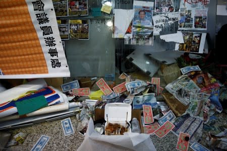 Joss paper and a funeral offering is pictured at the office of pro-China lawmaker Junius Ho destroyed by anti-extradition supporters in Hong Kong
