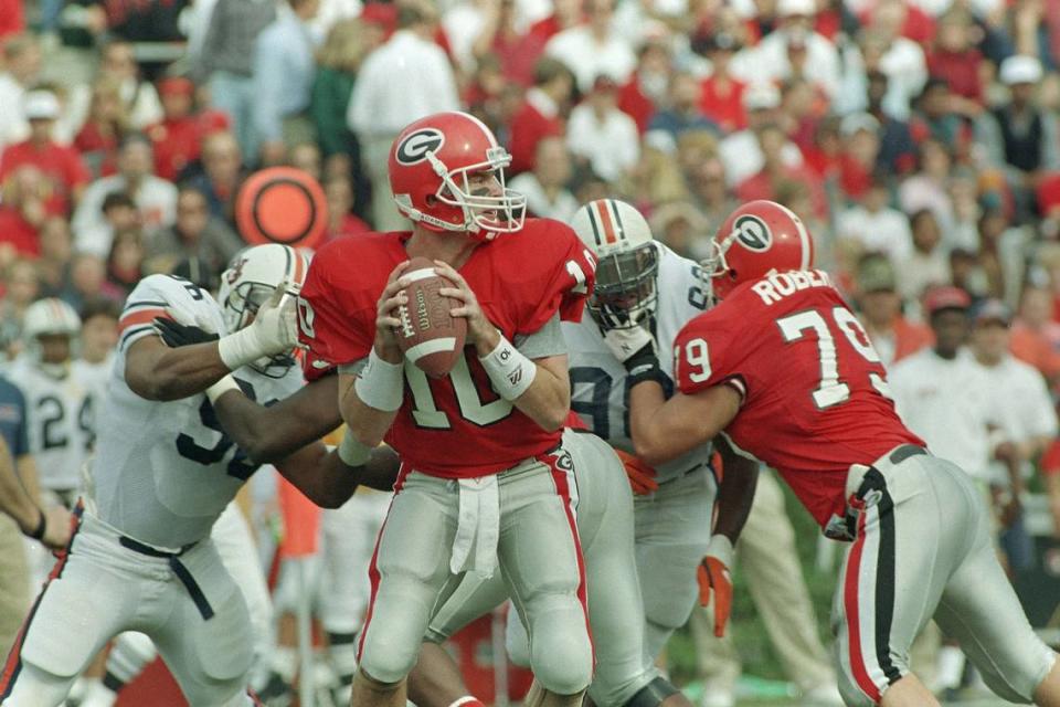 University of Georgia quarterback Eric Zeier looks for an open receiver from the pocket in this 1993 AP file photo. Zeier is a member of the Georgia Sports Hall of Fame’s 2022 class.