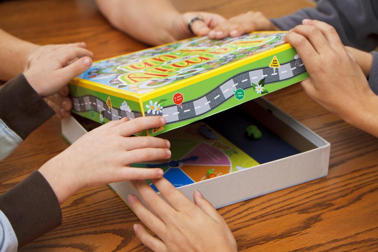 family choosing board games to play