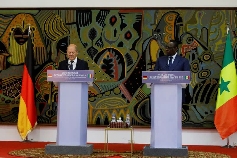 Senegal's president Macky Sall and German Chancellor Olaf Scholz hold a press conference at the presidential palace in Dakar,