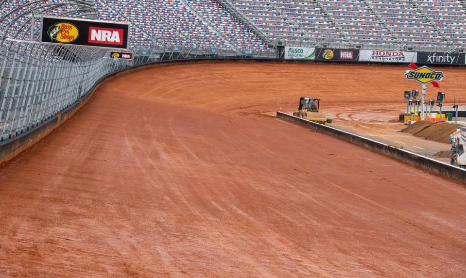 FILE - Bristol Motor Speedway has transformed the half-mile concrete track into a dirt track, in Bristol Tenn., in this Friday, Feb. 19, 2021, file photo. Bristol, once one of the toughest tickets in sports, trucked 23,000 cubic yards of dirt into its famed bullring to transform the facility and host NASCAR’s first Cup race on dirt in 70 years on Sunday, March 28. (David Crigger/Bristol Herald Courier via AP, File)
