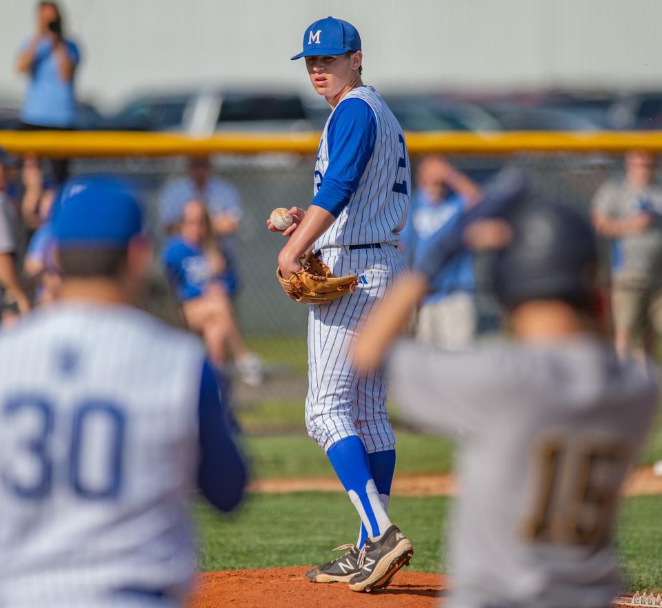 Memorial’s Matthew Fisher (2) glances over to first as Castle’s Hayden Hunt (15) prepares to advance to second during the final SIAC game of the season at N.J. Stone Field in Evansville, Ind., Tuesday afternoon, May 9, 2023