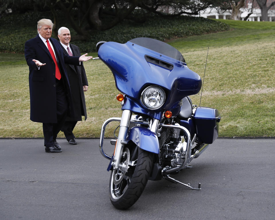 Trump and Pence admire one of the Harley-Davidson motorcycles brought to the White House in February 2017. (Photo: Pablo Martinez Monsivais/AP)