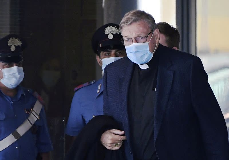 FILE PHOTO: Former Vatican economy minister George Pell arrives at Rome's Fiumicino Airport after travelling for the first time since his acquittal on child sex abuse charges in Australia