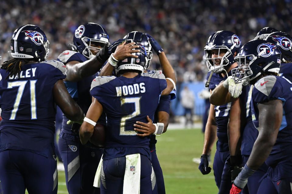 Tennessee Titans wide receiver Robert Woods (2) is congratulated during the second half of an NFL football game against the Dallas Cowboys , Thursday, Dec. 29, 2022, in Nashville, Tenn. (AP Photo/Mark Zaleski)