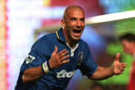 FILE - Chelsea's Italian star Gianluca Vialli jubilates after scoring for his team against Arsenal, in their English Premier League soccer match at London's Highbury stadium, Wednesday Sept. 4, 1996. Gianluca Vialli, the former Italy striker who helped both Sampdoria and Juventus win Serie A and European trophies before becoming a player-manager at Chelsea, has died on Friday, Jan. 6, 2023. He was 58. (AP Photo/Dave Caulkin, File)