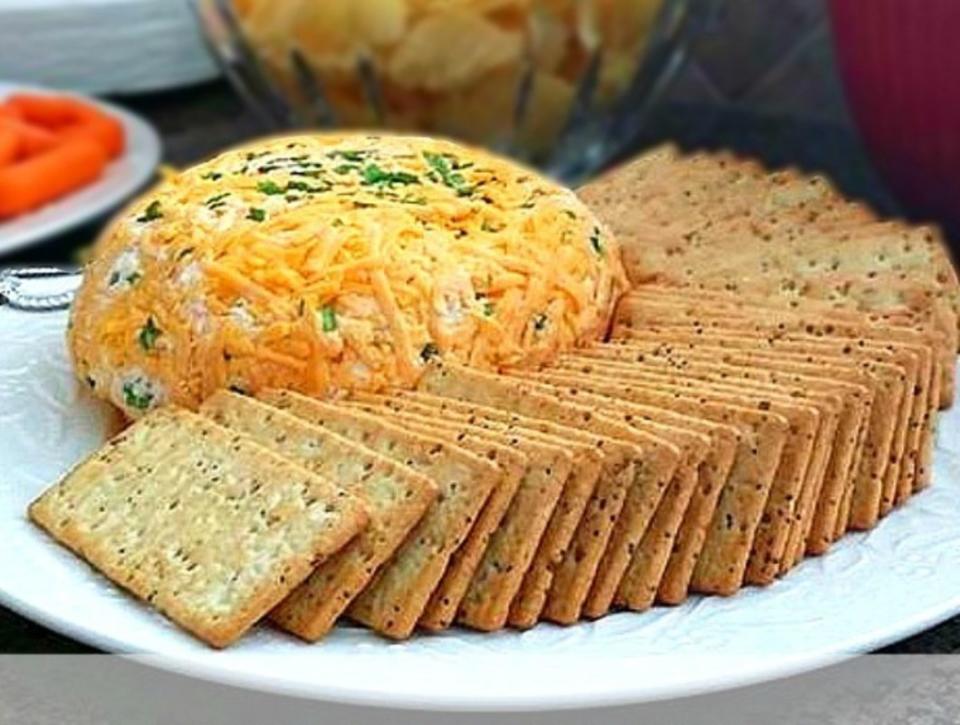 <p>Melissa's Southern Style Kitchen</p><p>This cheeseball features a sweet and salty edge that makes it a favorite appetizer to make and serve. Served with assorted crackers or pita chips, this one is always a crowd-pleaser! </p><p><strong>Get the recipe: <a href="https://www.melissassouthernstylekitchen.com/pineapple-cheeseball/" rel="nofollow noopener" target="_blank" data-ylk="slk:Pineapple Cheeseball;elm:context_link;itc:0;sec:content-canvas" class="link ">Pineapple Cheeseball</a></strong></p><p><strong>Related: <a href="https://parade.com/1054362/kristamarshall/fresh-pineapple-recipes/" rel="nofollow noopener" target="_blank" data-ylk="slk:30 Fresh Pineapple Recipes;elm:context_link;itc:0;sec:content-canvas" class="link ">30 Fresh Pineapple Recipes</a></strong></p>