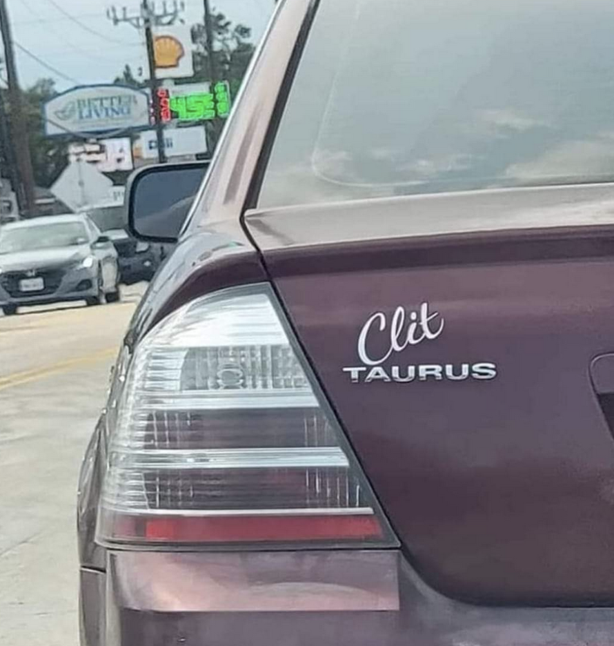 A car that says, "Clit Taurus"