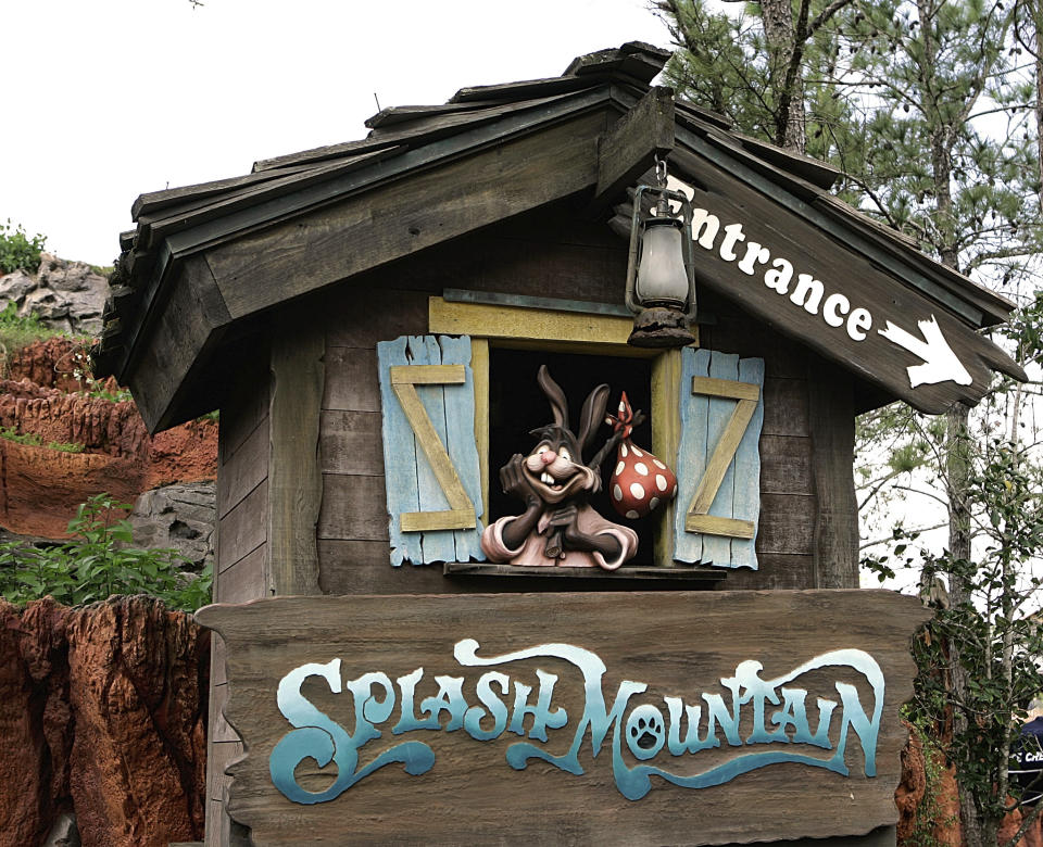 FILE- In this March 21, 2007 file photo, the character Brer Rabbit, from the movie, "Song of the South," is depicted near the entrance to the Splash Mountain ride in the Magic Kingdom at Walt Disney World in Lake Buena Vista, Fla. The Splash Mountain ride at Disney parks in California and Florida is being recast. Disney officials said the ride would no longer be tied to the 1946 movie, "Song of the South," which many view as racist. Instead, the revamped ride will be inspired by the 2009 Disney film, "The Princess and the Frog," which has an African-American female lead. (AP Photo/John Raoux, File)