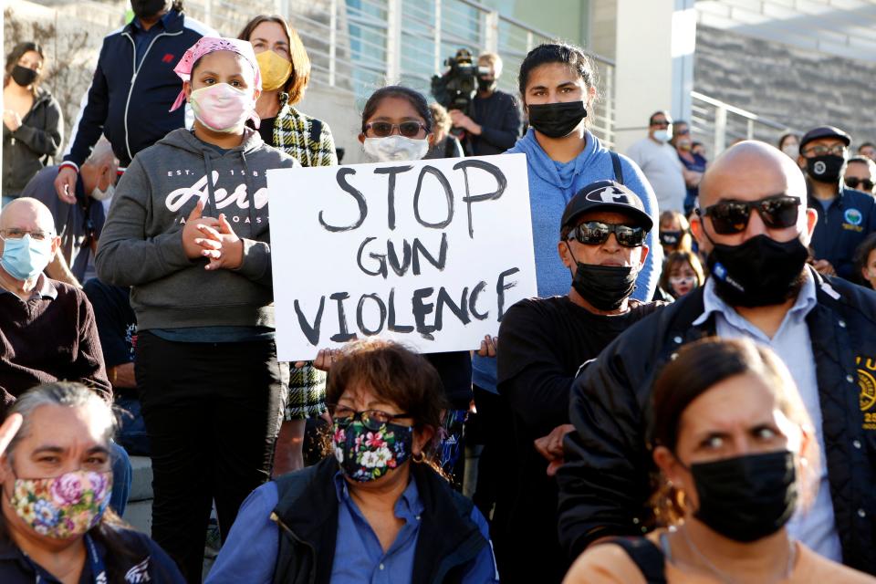 A vigil for the victims of a shooting 