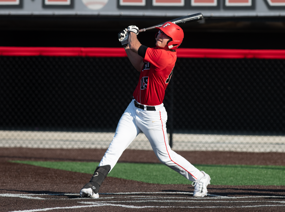 Kayden Smith takes a swing in last year's regional semifinal against NDCL.