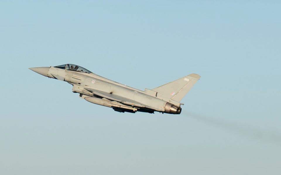 A Typhoon takes off from RAF Coningsby in Linconshire during a visit by Prime Minister Rishi Sunak following the announcement that Britain will work to develop next-generation fighter jets with Italy and Japan, on December 9, 2022 in Lincoln, United Kingdom. Sunak is working on â€œnew tough lawsâ€ to limit the impact of strikes, as Border Force staff prepared to join a wave of industrial action set to cause major travel disruption across the UK over Christma - Getty Images