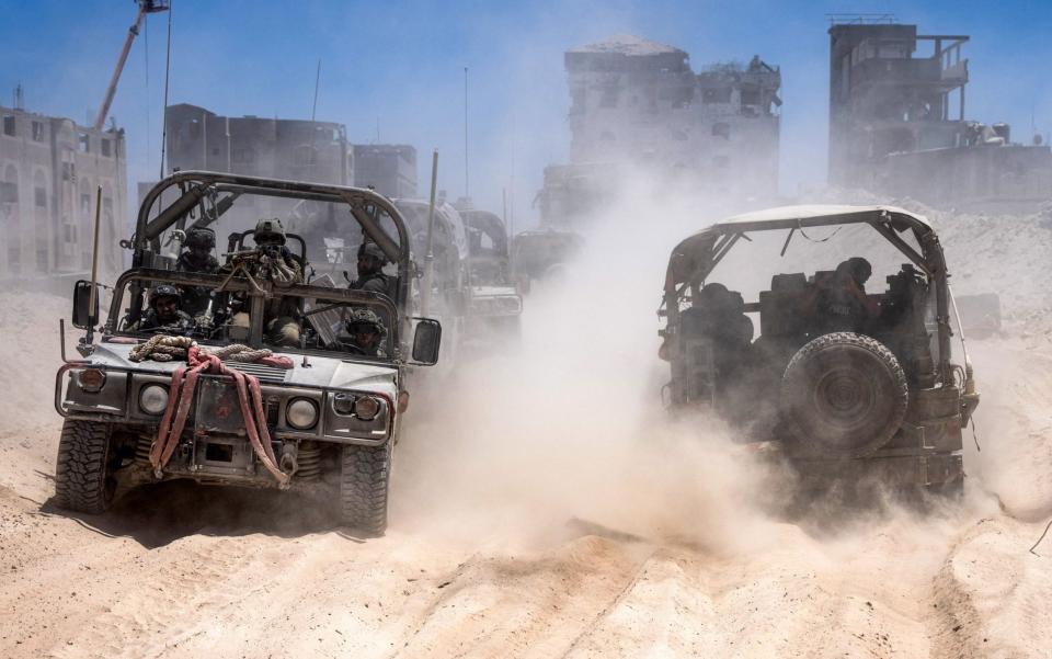 Israeli army vehicles inside the southern Gaza Strip on July 3