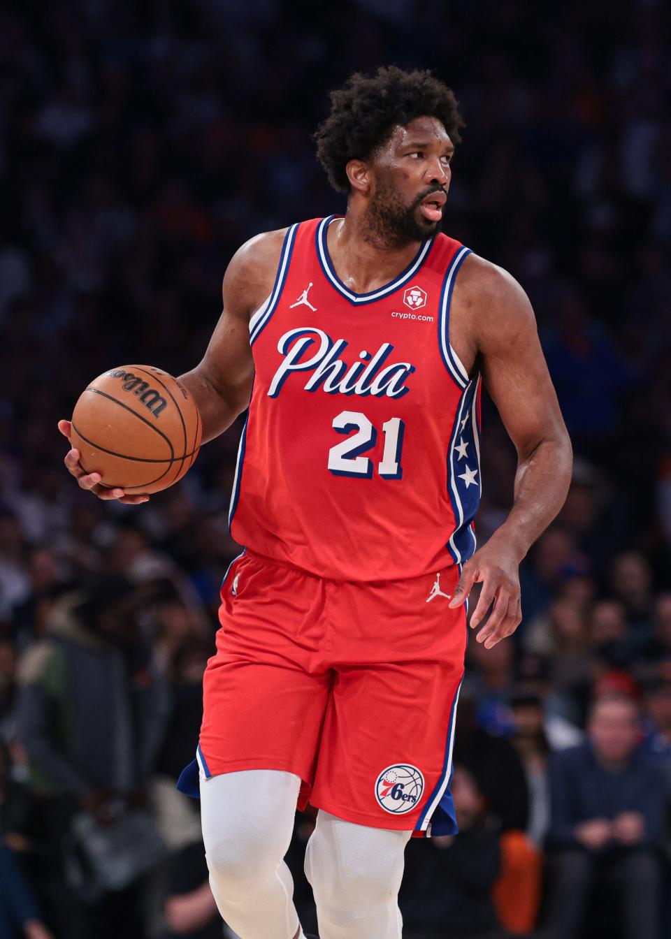 Philadelphia 76ers center Joel Embiid (21) dribbles up court during the first half of Game 2 of the first round of the 2024 NBA playoffs against the New York Knicks at Madison Square Garden.