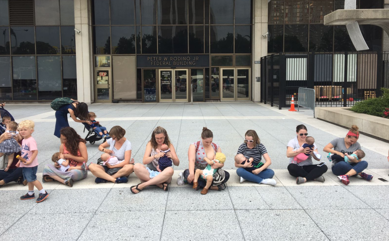 Women perform a “nurse in” to protest ICE and the separation of families. (Photo: @HiHemployers via Twitter)