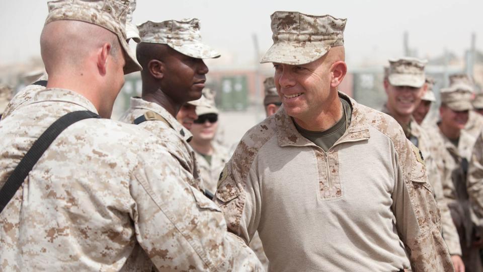 Then-Maj. Gen. David H. Berger, the commanding general of Task Force Leatherneck, 1st Marine Division (Forward), says goodbye to the Marines and sailors of Regimental Combat Team 5 in 2012. (Cpl. Alfred Lopez/Marine Corps)