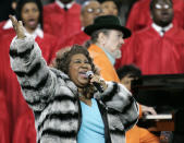 FILE - In this Feb. 5, 2006 file photo, Aretha Franklin and Dr. John, background on piano, perform the national anthem before the Super Bowl XL football game in Detroit. Franklin died Thursday, Aug. 16, 2018 at her home in Detroit. She was 76. (AP Photo/Gene J. Puskar, File)