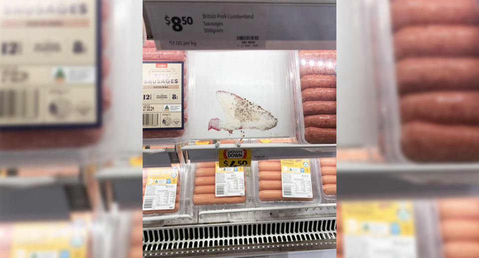 The Coles shopper's photo of the mould growing on the supermarket shelf holding raw beef sausages in the Pacific Fair store. 