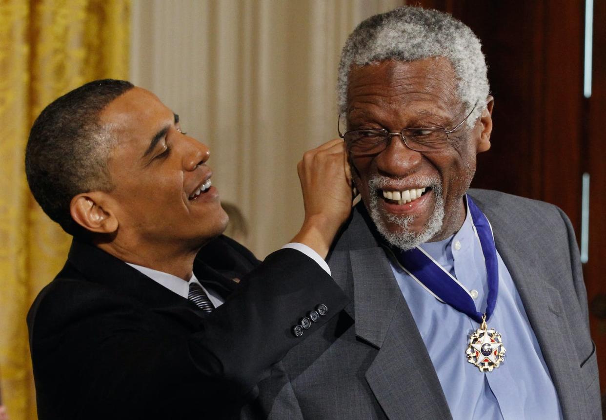 President Barack Obama presents NBA champion and human rights advocate Bill Russell the Medal of Freedom on Feb. 15, 2011. <a href="https://www.gettyimages.com/detail/news-photo/president-barack-obama-presents-basetball-hall-of-fame-news-photo/109136617?phrase=bill%20Russell&adppopup=true" rel="nofollow noopener" target="_blank" data-ylk="slk:Chip Somodevilla/Getty Images;elm:context_link;itc:0;sec:content-canvas" class="link ">Chip Somodevilla/Getty Images</a>