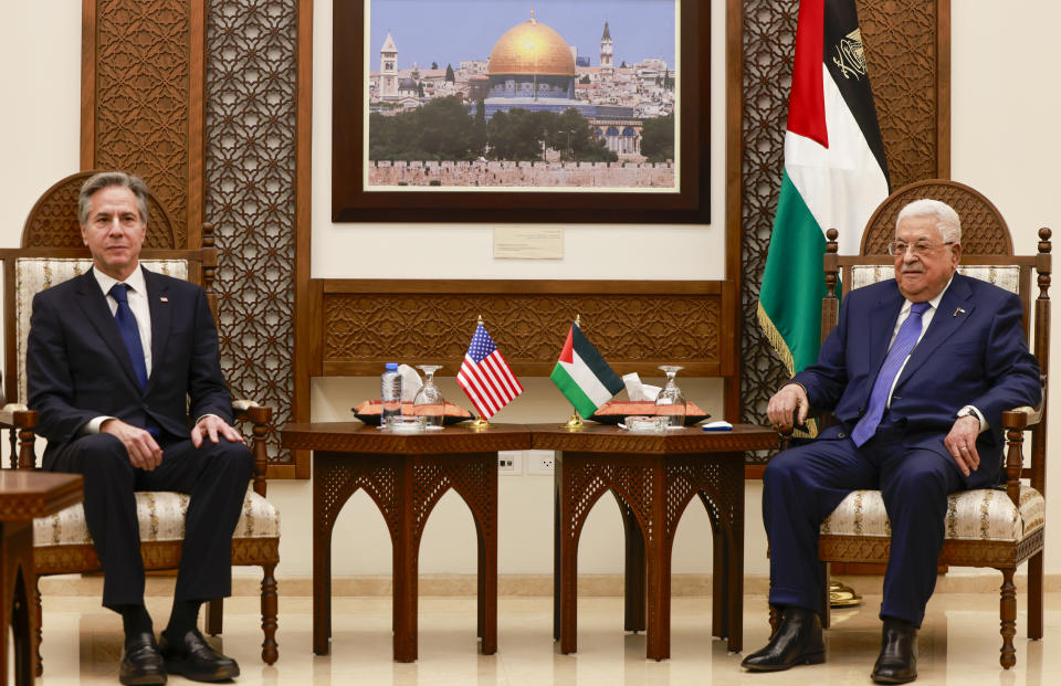 US Secretary of State, Antony Blinken, left, meets with Palestinian president Mahmud Abbas, right, in Ramallah in the Israeli-occupied West Bank on Wednesday, Jan. 10, 2024, during his week-long trip aimed at calming tensions across the Middle East. (Jaafar Ashtiyeh/Pool Photo via AP)