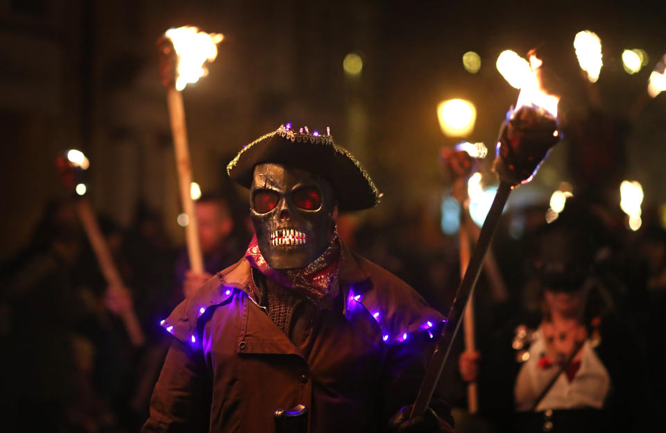 The procession held by the Lewes Bonfire Societies paraded along the narrow streets (PA)