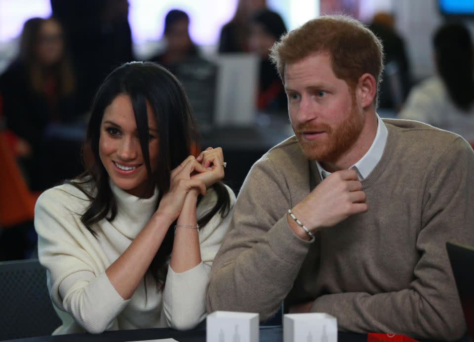 Harry and Meghan are big fans of spending cosy nights on the couch. Photo: Getty