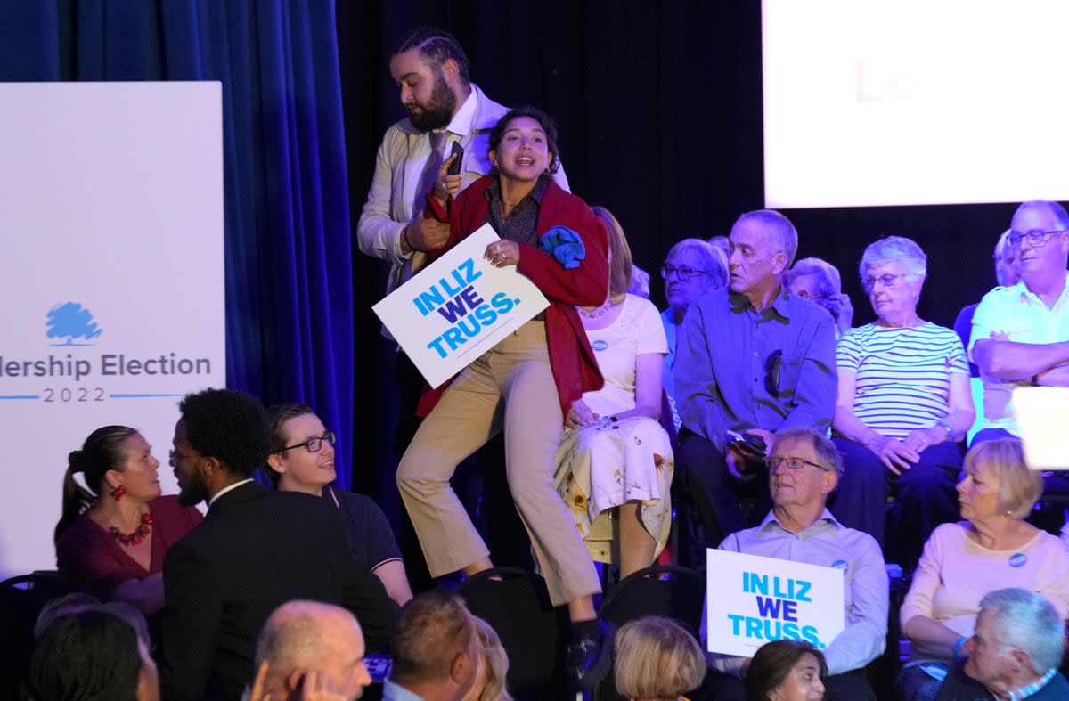 A protester is kicked out of the hustings  (Getty Images)