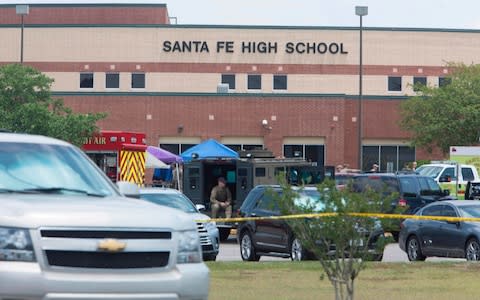 Emergency crews gather in the parking lot of Santa Fe High School - Credit: Daniel Kramer/AFP