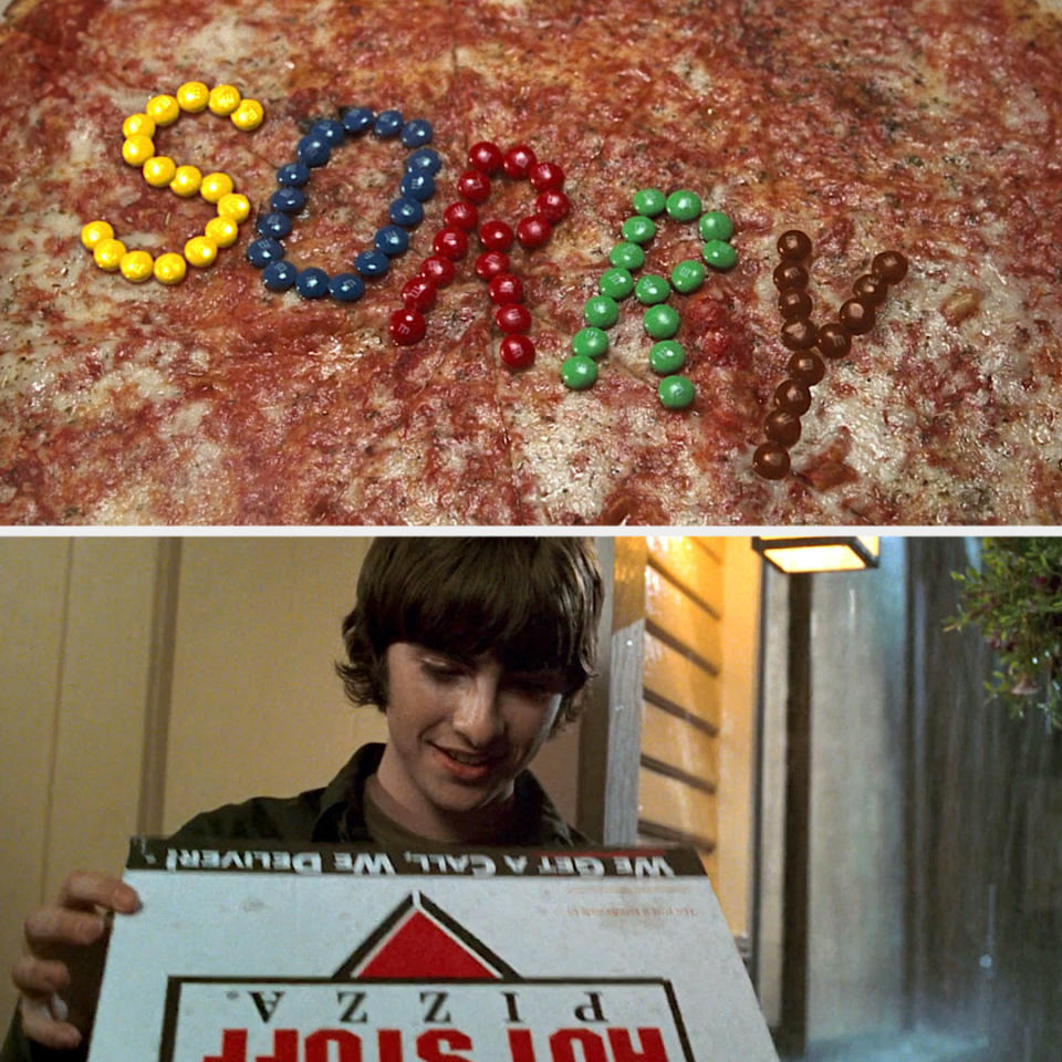 Mia (Anne Hathaway) blows off Michael (Robert Schwartzman) to hang out with another guy. He doesn't really accept her regular apology or an invite to the Genovian Independence Day Ball. So Mia sends him a pizza with an M&M apology on top. And we know how much Michael loves M&M's. He has them jumping around the keys while he's playing the piano. And honestly, Mia's going through a lot right now, so the fact that she even found the time to do this is pretty impressive.