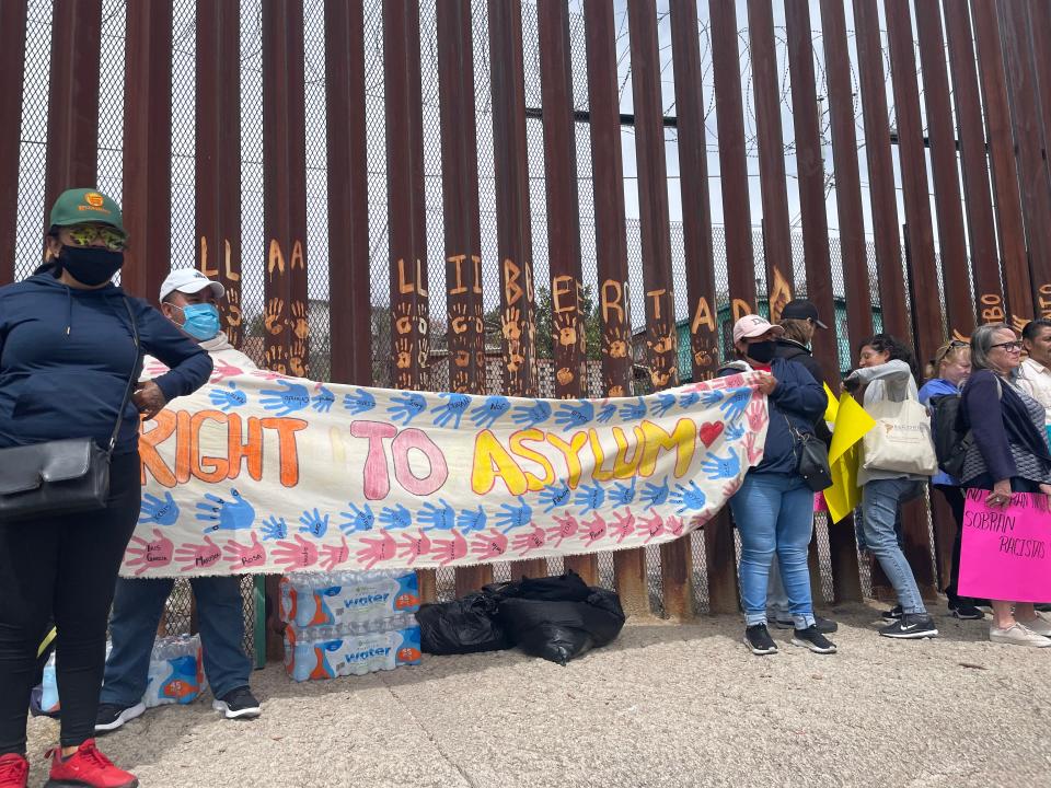 Migrants, advocates and faith leaders gather near the Dennis DeConcini Port of Entry in Nogales, Sonora, to commemorate the third anniversary of Title 42 on Tuesday, March 21, 2023.
