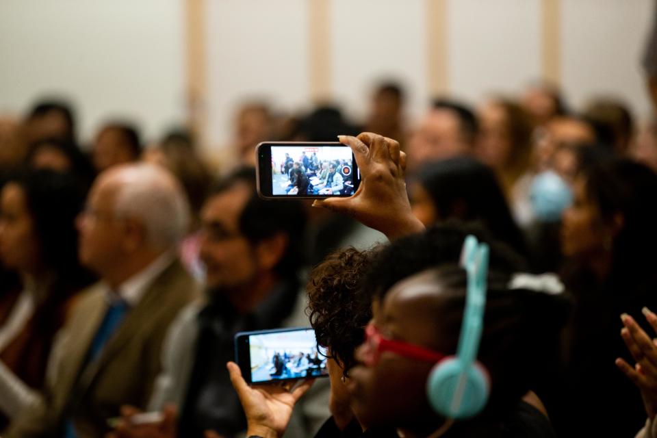 Dozens of people from across the globe were granted U.S. citizenship during a naturalization ceremony Thursday, Oct. 20, 2022, at Herrick District Library in Holland.