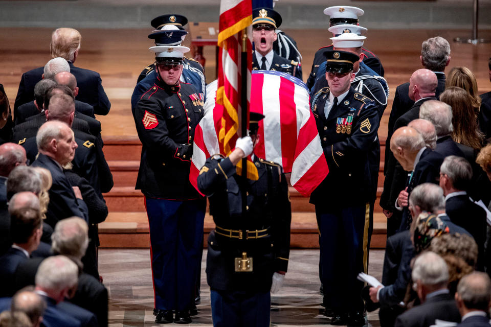 Members of the Honor Guard carry the flag-draped casket of former President George H.W. Bush out during his State Funeral at the National Cathedral, Wednesday, Dec. 5, 2018, in Washington. (Photo: Andrew Harnik/Pool via Reuters)