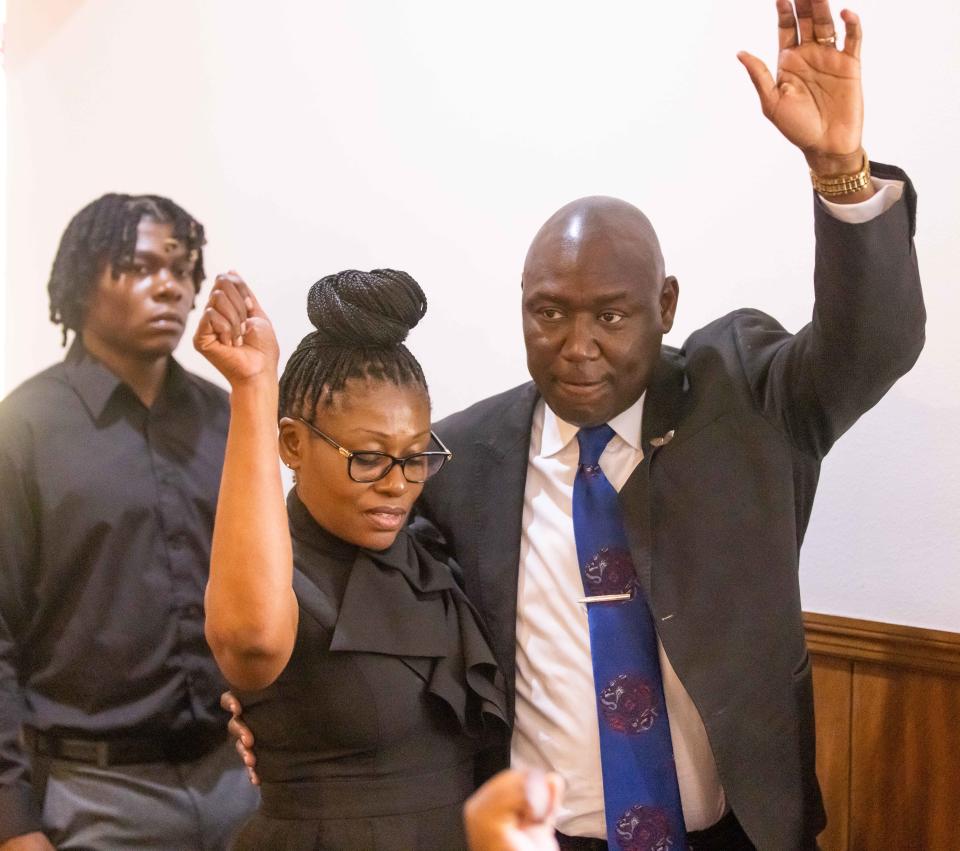 Civil Rights Attorney Ben Crump, right and Pamela Dias, center, the mother of Ajike "AJ" Shantrell Owens, make their way to the podium at the New St. John Missionary Baptist Church in Ocala, FL. About 100 people gathered for a press conference with Civil Rights Attorney Ben Crump Wednesday afternoon, June 7, 2023 at the New St. John Missionary Baptist Church in Ocala, FL. An arrest was made late Tuesday, early Wednesday morning in the fatal shooting of Ajike "AJ" Shantrell Owens. Crump represents the family. Owens was shot while standing outside her neighbor's door the night of June 2 in Quail Run, located off County Road 475A in Ocala. Quail Run consist of single story duplex and quadraplex. Susan Louise Lorincz, 58, now faces charges of manslaughter with a firearm, culpable negligence, two counts of assault and battery. [Doug Engle/Ocala Star Banner]2023